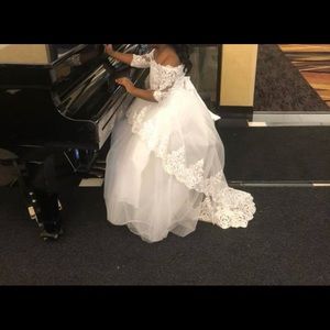 Elegant lace beaded flower girl dress.